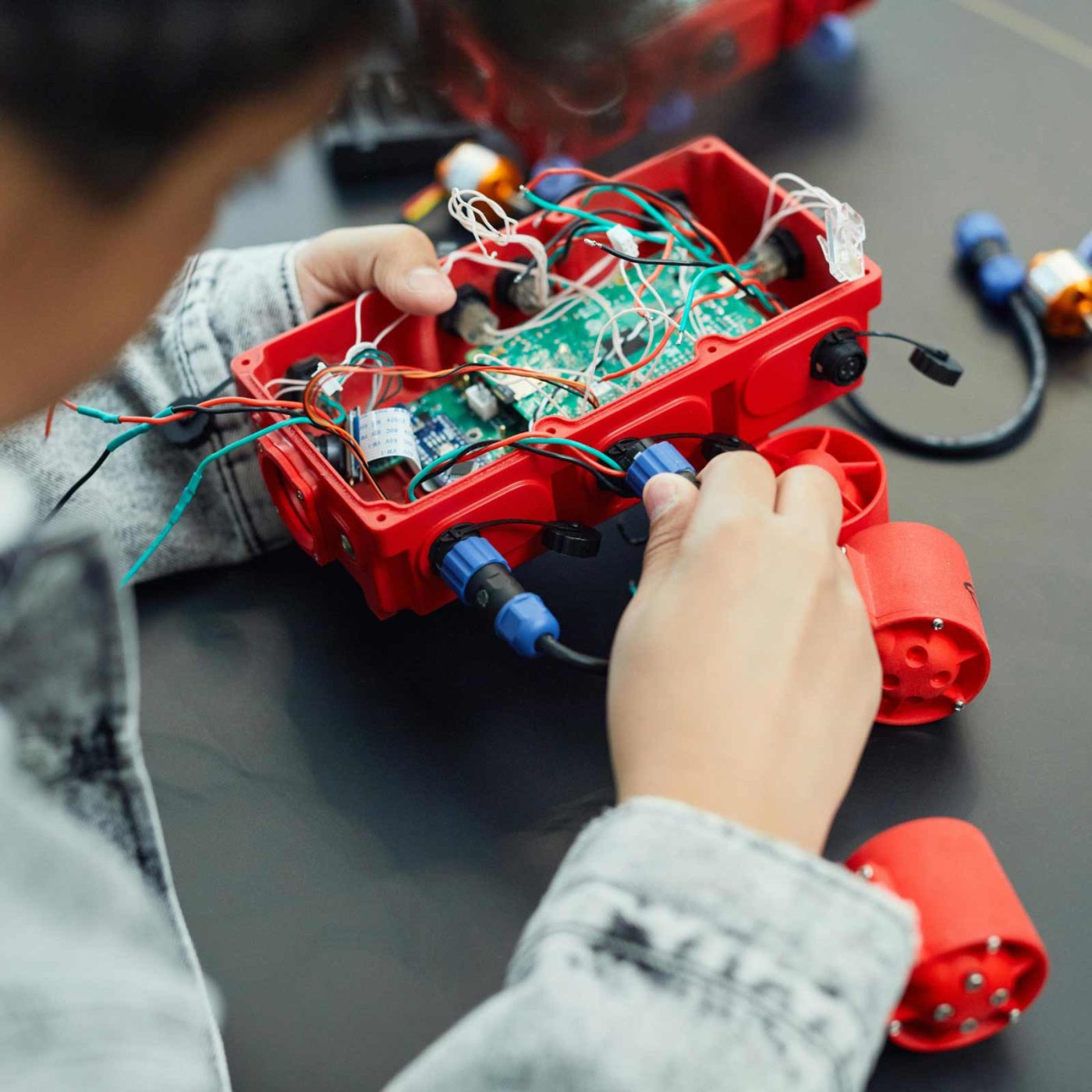 NCCS Group - Engineer constructing cable box.