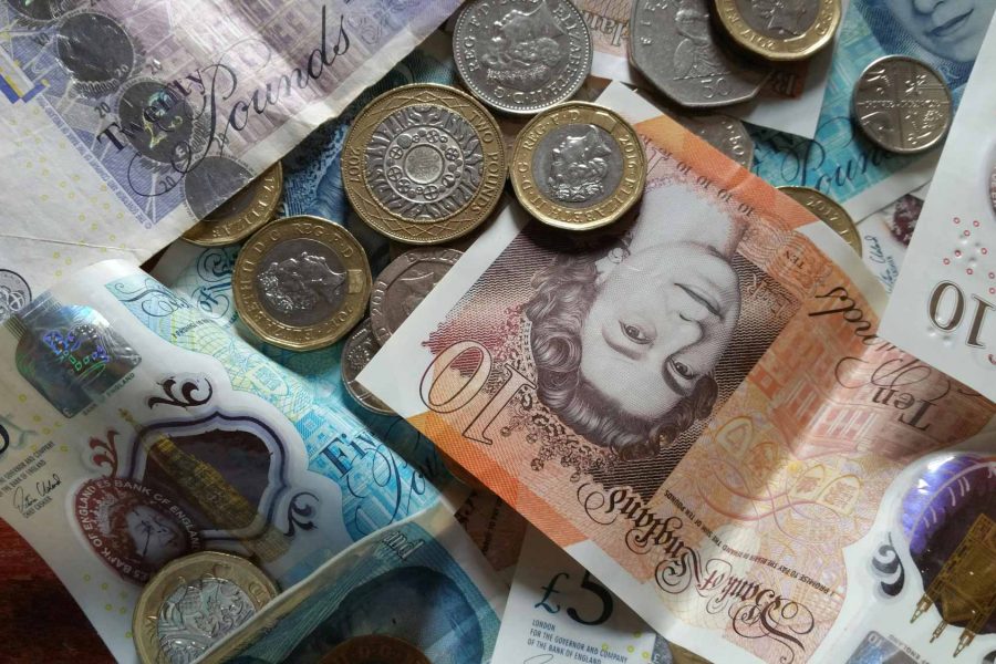 NCCS Group - Cash Collection - Image of a pile of British pound notes and coins